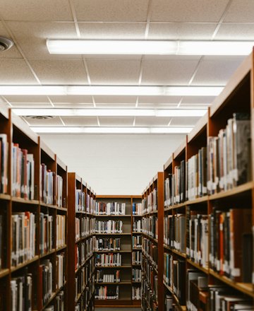 Rows of shelves in a university library